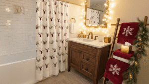 Cozy Christmas bathroom with reindeer shower curtain, red towels, and festive decor, illuminated by warm golden hour light.