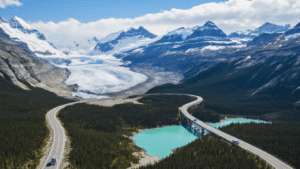 "Aerial view of Icefields Parkway winding through Canadian Rockies with Columbia Icefield, Athabasca Glacier, Peyto Lake, Ice Explorer buses, and Athabasca Falls under a clear blue sky"