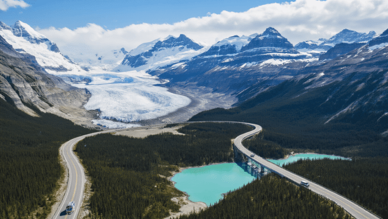"Aerial view of Icefields Parkway winding through Canadian Rockies with Columbia Icefield, Athabasca Glacier, Peyto Lake, Ice Explorer buses, and Athabasca Falls under a clear blue sky"